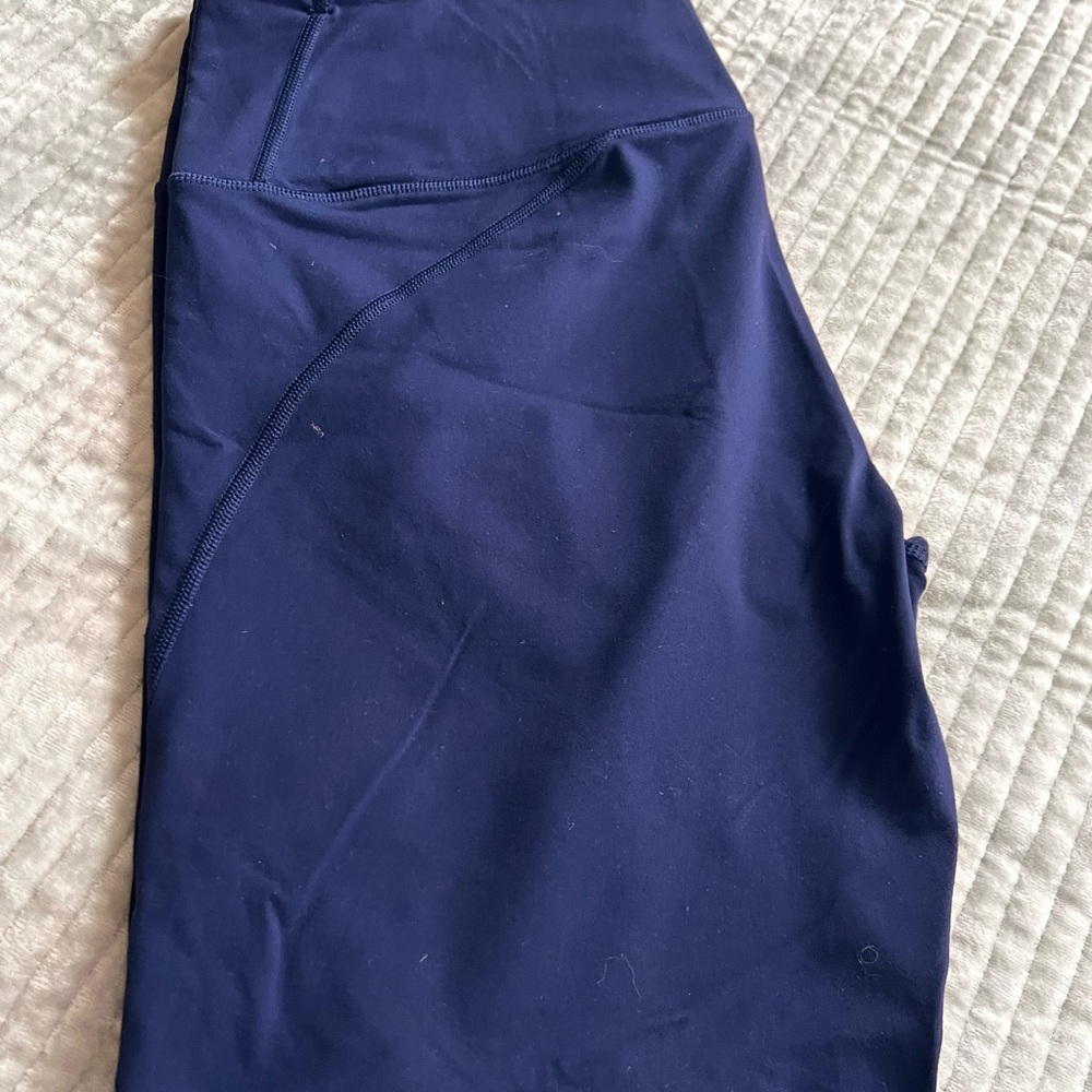Yoga pants with sheer mesh inserts